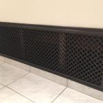 large ribbon resin vent cover on wall